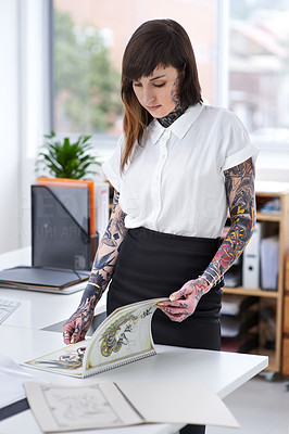 Her tattoo business is flourishing