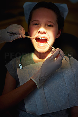 Under the dentist\'s light