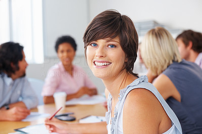 Attractive business woman in meeting
