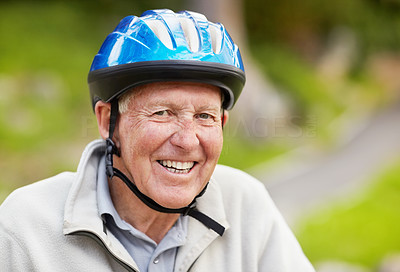 Closeup of a sporty mature man wearing bicycle helmet