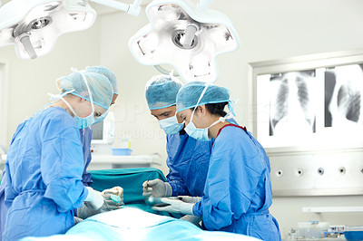 Experts working as a team for surgical success