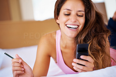 Beautiful woman reading text message