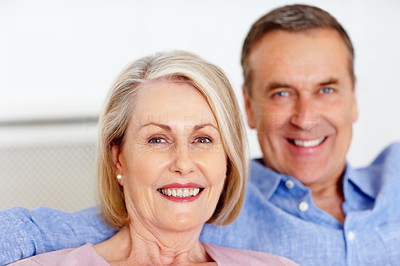 Retired mature woman and man together having a good time