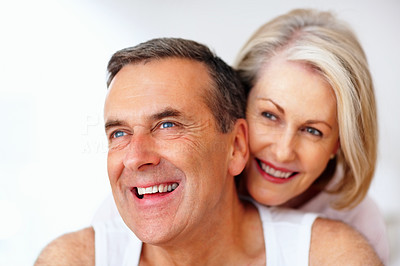 Romantic couple having fun against white background