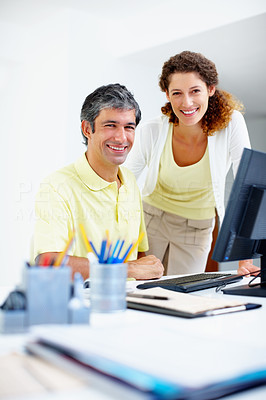 Business people smiling at work