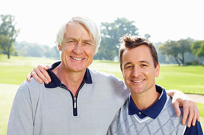 Father and son on the golf course