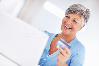 Mature woman shopping online
