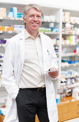 Pharmacist with medical prescription