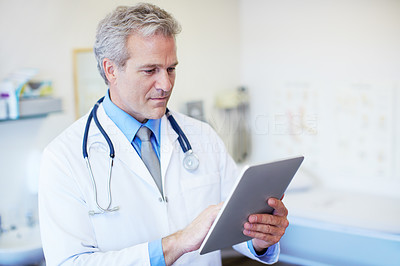 Using his tablet for an accurate diagnosis
