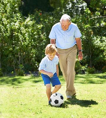 Learning some soccer skills from grandpa