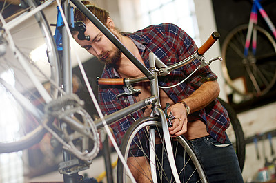 Happiest when he\'s tinkering with bikes