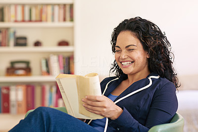 She\'s reading one of those feel-good books