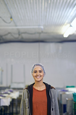 She enjoys her job in the food processing industry