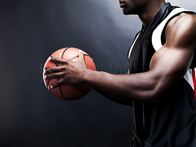 Young man playing basketball - Cropped