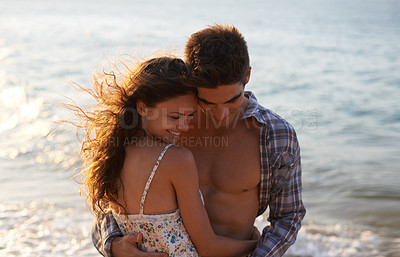 Embracing on the beach