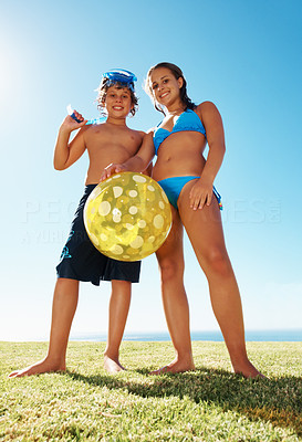 Brother and sister in a swimming costume
