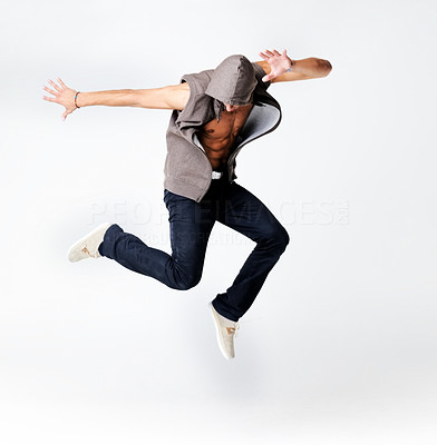 Modern style - Young male hip hop dancer jumping