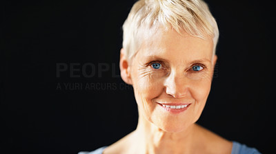 Closeup of smiling elderly lady isolated over white background