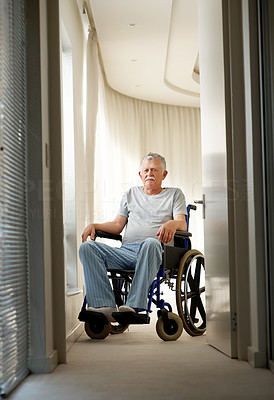Portrait of an elderly man on a wheel chair