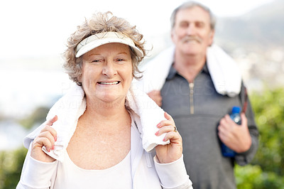 Old couple with towel after workout - Outdoor