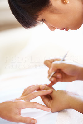 Manicurist in action