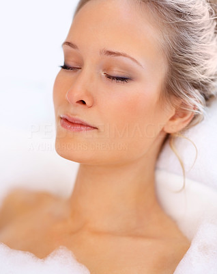 Closeup of a woman relaxing at a bath