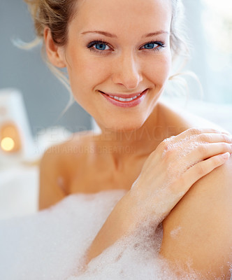 Pretty woman during a bubble bath