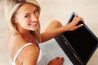 Happy young lady using laptop - Top view
