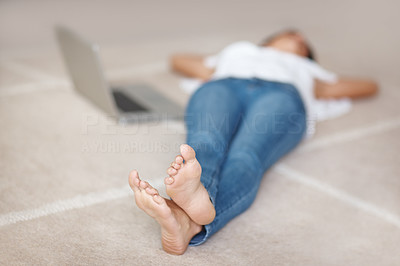 Female on the floor , focus on feet