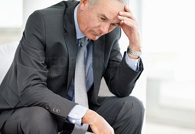 Stressed business man thinking about something