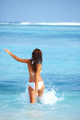 Woman walking in bikini