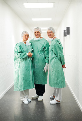 Successful medical team in scrubs at work