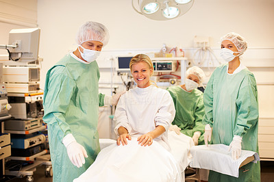 Surgeons and patient ready for the surgery in operation theater