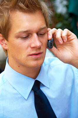 Businessman making a phone call.