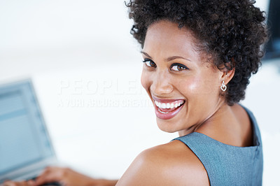 Business woman smiling at work