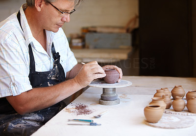 Dedicated to his work - Pottery