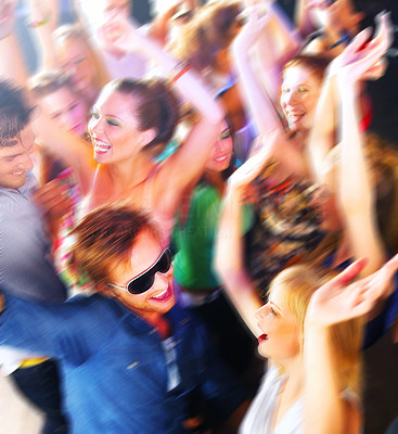 People dancing in a bar or nightclub at a party