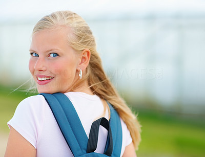 Young female student on her way to college