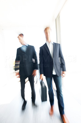 Business people hurrying to the office - Motion blurred