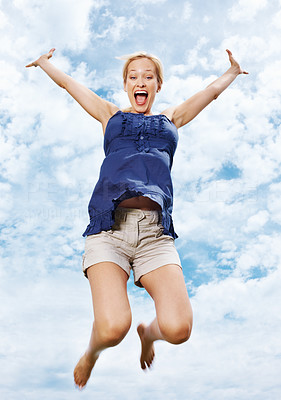 Woman jumping mid-air