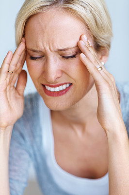 Woman suffering from head pain