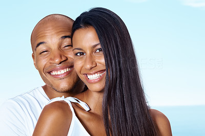 Smiling young guy posing with his girlfriend