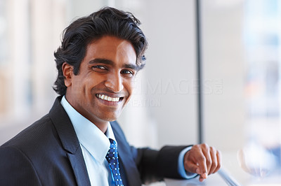 Portrait of an Indian business man smiling confidently
