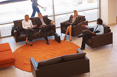Top view: Professional business people sitting in the hotel lounge