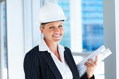 A young and successful woman architect, smiling