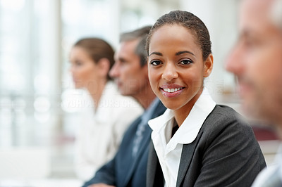 An African American business woman at a conference