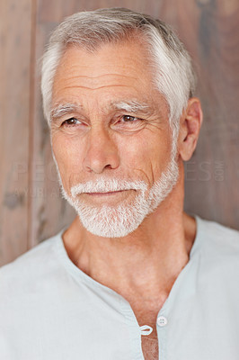 Mature man over a wooden background
