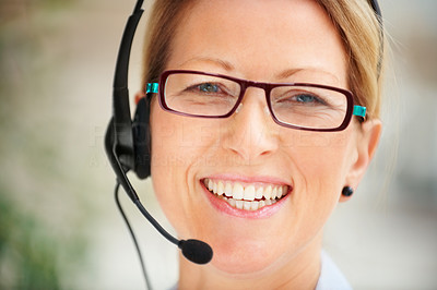 Beautiful happy gorgeous lady smiling while communicating on headset