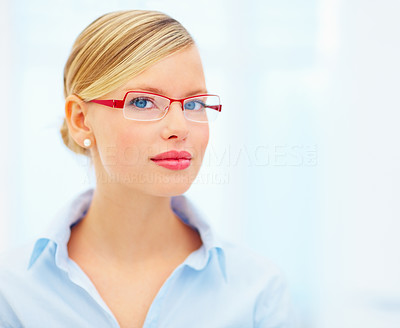 Closeup of a beautiful woman wearing red color glasses