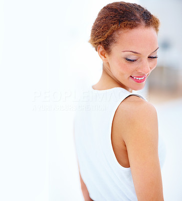Side view of expressive young woman glancing backward